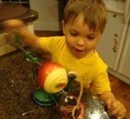 Even a toddler can iuse an apple peeler!